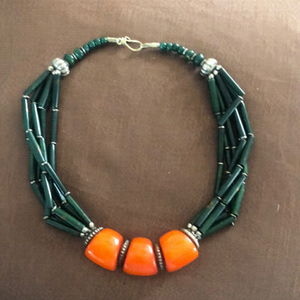 Vintage Bakelite Bedouin orange beads and green🦋